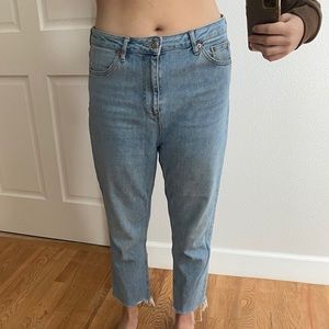 Kindly worn loose fitted mom style jeans